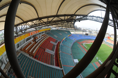 The photo taken on July 18, 2008 shows the tribune of the Qinhuangdao Olympic Sports Center Stadium in Qinhuangdao, east China's Hebei Province. The Qinhuangdao Olympic Sports Center Stadium will host 12 football matches during the 2008 Beijing Olympic Games.