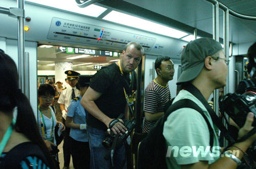 Beijing opened three new subway lines on Saturday morning to ease traffic during the Olympic Games.