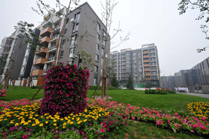Athletes' apartment buildings in the Olympic Village in Beijing is seen in this picture taken on July 20, 2008. The village began testing operations on Sunday and will be officially opened on July 27 for the Olympics and Paralympics. [Xinhua] 