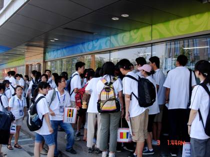 All of the students finding their own countries and groups are waiting outside of the NOC building inside of the Olympic Village to meet the 'fake' delegates and athletes.