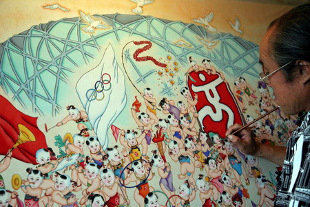 Dong Jing, an artist of traditional Chinese New Year painting, paints the finishing touches to his latest work on the theme of welcoming the Beijing 2008 Olympics in Ninghe county, Tianjin Municipality, July 21 2008. The paining is 1.75 meters long and 0.93 meter high, and takes Dong forty days to finish. [Xinhua]