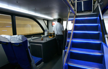 An interior view of the sightseeing double-deck bus Line 2, which passes some Olympic venues such as the National Stadium and National Aquatic Center is seen in this photo taken on July 17, 2008.The other bus Line 1 has the theme of 'Ancient City' and goes by such historical areas as the Temple of Heaven, Tian'anmen Square, and Forbidden City. 