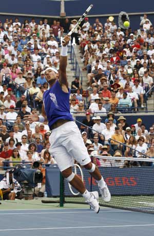 Rafael Nadal of Spain follows through on a shot against Nicolas Kiefer of Germany during their Men's Singles Final at the Rogers Cup tennis tournament in Toronto on July 27, 2008.(Xinhua/Reuters Photo)