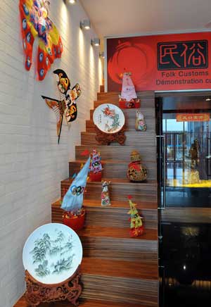 The photo taken on July 27, 2008 shows a corner of the folk customs culture exhibition at the Qingdao Olympic village in Qingdao, the co-host city for sailing events of the Beijing 2008 Olympic Games, in east China's Shandong Province.