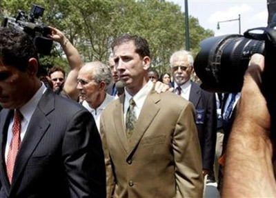 Former NBA referee Tim Donaghy (C) leaves Brooklyn federal court after his sentencing in New York July 29, 2008. 