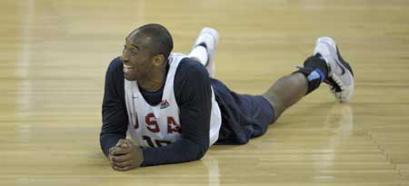 U.S. basketball team player Kobe Bryant stretches during a training session for the Beijing Olympics at the Venetian Macao-Resort-Hotel in Macau July 30, 2008.