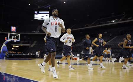 U.S. basketball team players run during a training session for the Beijing Olympics at the Venetian Macao-Resort-Hotel in Macau July 30, 2008. 