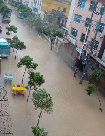 Rainwater floods a street in Xiapu, Fujian province, on July 29, 2008. 