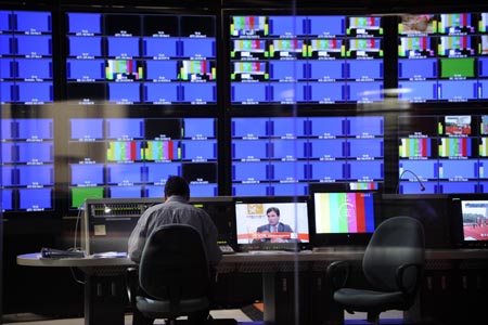 The photo taken on July 29, 2008 shows the master control room of the Beijing Olympic Broadcasting Co. Ltd (BOB) in the International Broadcasting Center (IBC) in Beijing, China. It’s said that high definition signals will be first-ever used for TV relays for all 28 events of Beijing 2008 Olympic Games. BOB will produce live TV signals of 5,400 hours for right-holding broadcasters and it’s estimated that more than four billion viewers will enjoy the olympic competition through TV broadcasts in 2008.