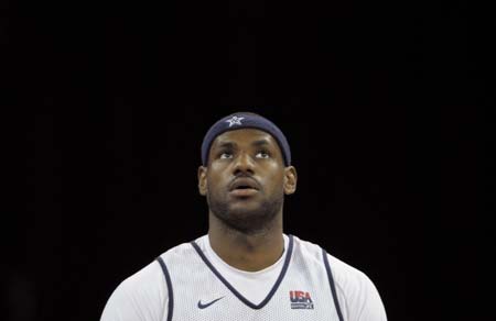 U.S. basketball team player LeBron James looks up during a training session for the Beijing Olympics at the Venetian Macao-Resort-Hotel in Macau July 30, 2008.