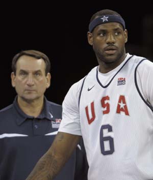 U.S. basketball team player LeBron James (R) and head coach Mike Krzyzewski attend a training session for the Beijing Olympics at the Venetian Macao-Resort-Hotel in Macau July 30, 2008.