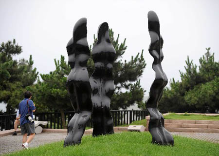 Photo taken on July 30, 2008 shows a sculpture at the Olympic co-host city Qingdao, east of China. The sailing events for the Games of the XXIX Olympiad will be held within Qingdao International Sailing Center, the five water areas outside Fushan Bay. A unique blend of sea and mountains makes Qingdao a well-known summer resort. With an average temperature ranging from 20-28 degrees celsius, the period from July through September is the most agreeable season for the tour.