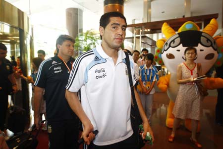 Argentinian Olympic men's football team player Juan Riquelme (front) arrives at a hotel in Olympic co-host city Shanghai, east China, July 31, 2008.