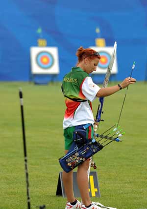 Archer Katsiarina Muliuk of Belarus takes part in a training session at the Olympic Green Archery Field in Beijing, China, July 31, 2008. Archers started their applicability training sessions after their arrivals in Beijing. (Xinhua/Zhang Ling)