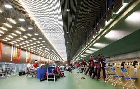 Shooters practise during a training at the Beijing Shooting Range in Beijing, capital of China, July 31, 2008. 