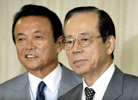 Japanese Prime Minister Yasuo Fukuda (right) stands alongside Taro Aso, newly appointed Secretary General of ruling Liberal Democratic party (LDP), in Tokyo. Fukuda has reshuffled his cabinet, bringing in more than a dozen new ministers in a last-ditch bid to revive waning public approval as elections loom.