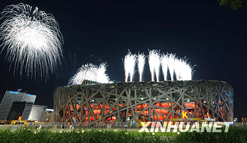 Fireworks explode over the National Stadium during the second full dress rehearsal of the opening ceremony of Beijing 2008 Olympic Games in Beijing, capital of China, Aug. 2, 2008. (Xinhua/Li Gang)