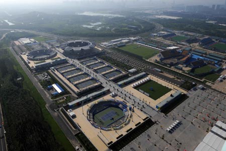 The aerial photo taken on August 2, 2008 shows the Beijing Olympic Green Tennis Court in Beijing, China. The tennis competition of the Beijing 2008 Olympic Games will be held there. (Xinhua/Guo Dayue) 