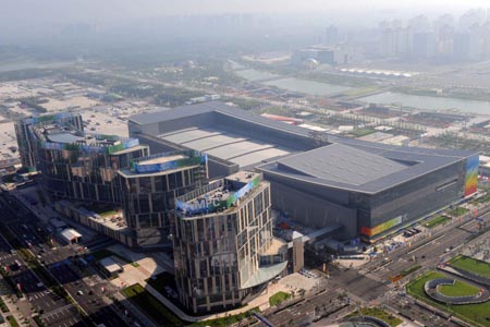 The aerial photo taken on August 2, 2008 shows the Main Press Center and Fencing Hall of National Convention Center in Beijing, China. (Xinhua/Guo Dayue)