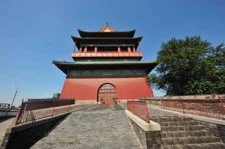 Photo taken on Aug. 3, 2008 shows the Drum Tower in Beijing, capital of China. Bells and Drums were used by the ancient Chinese to tell times. The Bell and Drum Towers in Beijing, built in 1272 and rebuilt twice after fires, tolled the hours during the ancient China's Yuan, Ming and Qing Dynasties (1271-1911). Lying to the north of the central axis of Beijing, the Bell and Drum Towers are visibly prominent constructions and has long standing as the symbol of this old city. 