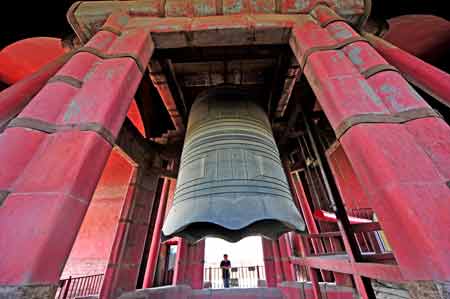 Photo taken on Aug. 3, 2008 shows the giant bell in the Bell Tower in Beijing, capital of China. With a height of 7.02 meters and weight of 63 tons, the bell is believed to be the largest and heaviest in China, Bells and Drums were used by the ancient Chinese to tell times.