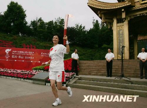 Gao Min kicks off the torch relay in Leshan, Sichuan Province August 4. 
