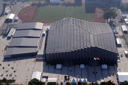 The aerial photo taken on August 2, 2008 shows the China Agricultural University Gymnasium in Beijing, China. The wrestling competition of the Beijing 2008 Olympic Games will be held there. (Xinhua/Guo Dayue)