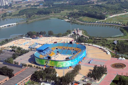 The aerial photo taken on August 2, 2008 shows the Chaoyang Park Beach Volleyball Ground in Beijing, China. The beach volleyball competition of the Beijing 2008 Olympic Games will be held there. (Xinhua/Chen Kai)