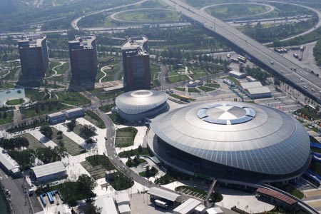 The aerial photo taken on August 2, 2008 shows the Beijing University of Technology Gymnasium in Beijing, China. The badminton and rhythmic gymnastics competitions of the Beijing 2008 Olympic Games will be held there. (Xinhua/Guo Dayue)