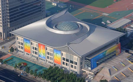 The aerial photo taken on August 2, 2008 shows the Peking University Gymnasium, in Beijing, China. The table tennis competition of the Beijing 2008 Olympic Games will be held there. (Xinhua/Chen Kai)