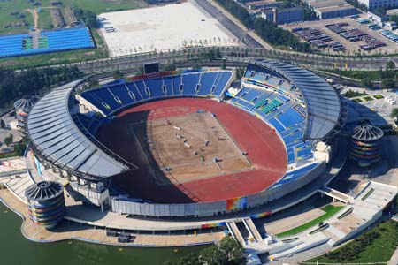 The aerial photo taken on August 2, 2008 shows the Olympic Sports Center Stadium in Beijing, China. The modern pentathlon competition of the Beijing 2008 Olympic Games will be held there. (Xinhua/Guo Dayue)