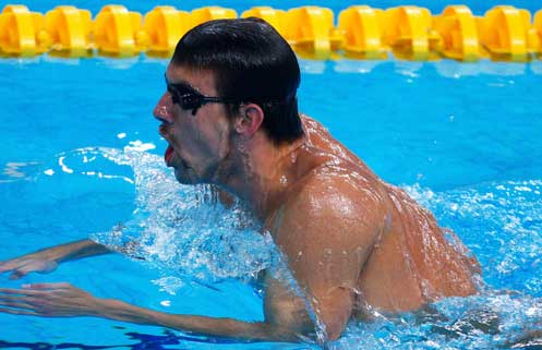Michael Phelps trains in Water Cube[CFP]