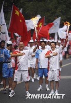 The Olympic torch is carrying through Leshan, Sichuan province.