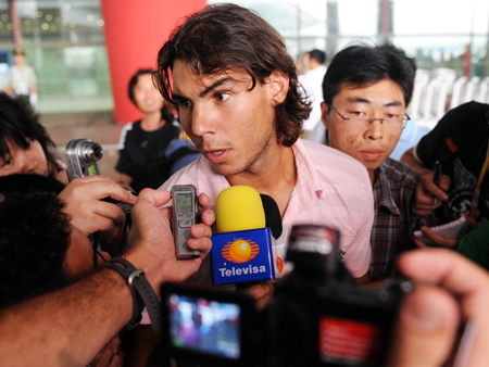 Spanish tennis player Rafael Nadal speaks to reporters at the Beijing Capital International Airport in Beijing, China, Aug 4, 2008. Nadal arrived here Monday for the Olympic tennis event which will start on Aug 10.