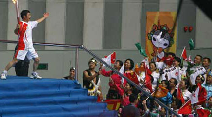 Olympic flame raises spirits of quake survivors