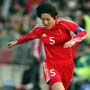 Chinese veteran midfielder Pu Wei