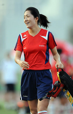 Chinese football player Pu Wei prepares for training at the Tianjin Olympic Center Stadium, August 4, 2008. 