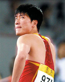 Liu Xiang is seen wearing his new track suit during the Good Luck Beijing Track and Field International Invitational Tournament in May. [China Daily] 