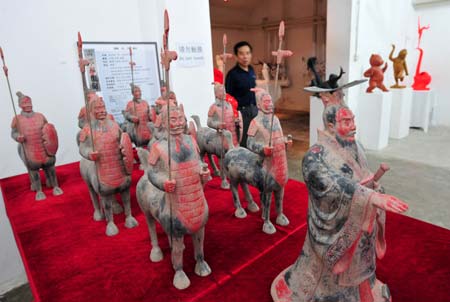 Photo taken on Aug. 5, 2008 shows pottery sculptures at 798 Art Zone in Beijing, capital of China. 