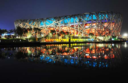 Photo taken on Aug. 5, 2008 shows the National Stadium, nicknamed the Bird&apos;s Nest, in the evening in Beijing, China. Beijing witnessed a fine weather Tuesday. (Xinhua/Guo Lei) 