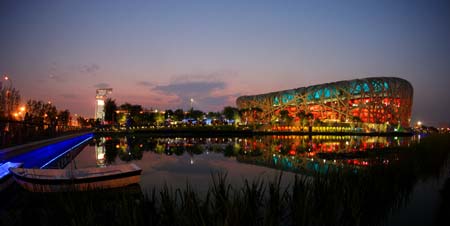 Photo taken on Aug. 5, 2008 shows the National Stadium, nicknamed the Bird&apos;s Nest, in the evening in Beijing, China. Beijing witnessed a fine weather Tuesday. (Xinhua/Guo Lei) 