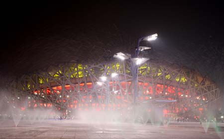 Picture taken on Aug. 5, 2008 shows the fountain in front of the National Stadium, nicknamed the Bird&apos;s Nest, in Beijing, China. A dress rehearsal of the opening ceremony of Beijing 2008 Olympic Games was held on Tuesday. (Xinhua/Chen Jianli)