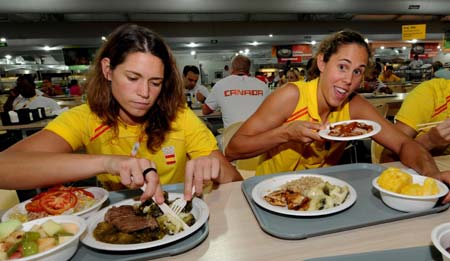 The Olympic Village, located in the Olympic Green in north Beijing and divided into three sections of the international area, residential area and operations area, houses about 16,000 athletes, coaches and their entourage from over 200 countries and regions coming for the Olympics. (Xinhua/Zhang Guojun) 