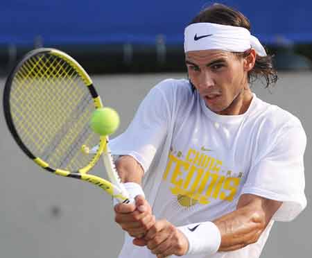Spanish tennis player Rafael Nadal attends a training session at the Beijing Olympic Green Tennis Court in Beijing, China, Aug. 5, 2008. 