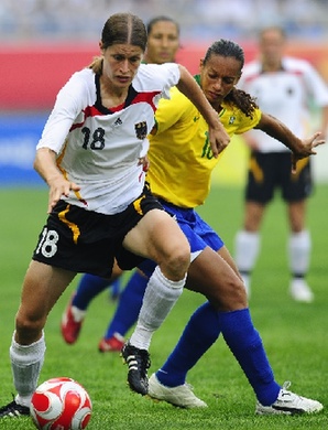 2007 World Cup champions Germany met then runners-up Brazil in Beijing Olympic women's soccer preliminary in Shenyang, August 6, 2008.