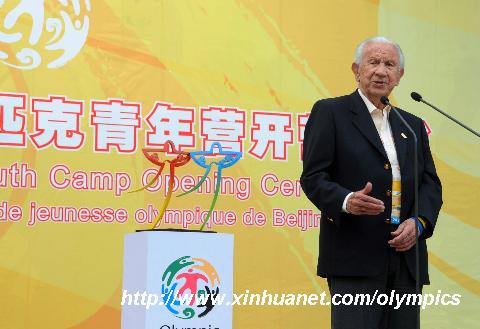 Juan Samaranch, former International Olympic Committee (IOC) president, addresses the opening ceremony of the Beijing 2008 Olympic Youth Camp in the Beijing 101 Middle School in Beijing, China, Aug. 6, 2008. The Olympic Youth Camp officially opened on Wednesday is an integrant part of the Olympic Games and is of great significance in carrying forward the Olympic Movement. [Chen Xie/Xinhua]