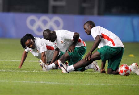 Players of Cameroonian Olympic football team practise during a training session in Qinhuangdao