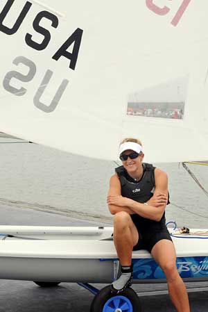 A woman sailor of America has a rest during training session at the Qingdao Olympic Sailing Center in Olympic co-host city Qingdao, east China's Shandong Province, Aug. 2, 2008. Smiles of sailors from all over the world for the upcoming Olympic sailing competition became attractive scenery in the Center.[Xinhua] 