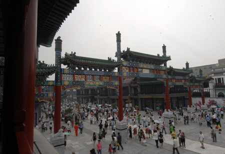  Photo taken on Aug. 7, 2008 shows crowds of visitors on the newly-renovated Qianmen Street, in central Beijing, China, Aug. 7, 2008. 