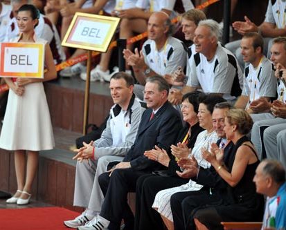 Jacques Rogge joins compatriots in the Belgium flag-raising ceremony. 